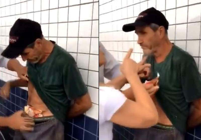 Vanderlei com a comida e sendo agredido - Foto: Reprodução/Twitter